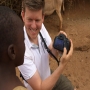 Jan Bolmeson showing pictures to locals