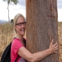 Tina Bjerke hugging a 20 year old mukau tree