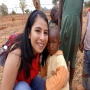 Ambreen hugging one of the local children