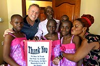 Jan-Tore with his sponsor triplets Sandra, Morine and Cissy